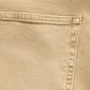 Close-up of a beige fabric pocket with visible stitching, likely from a pair of pants or jeans.