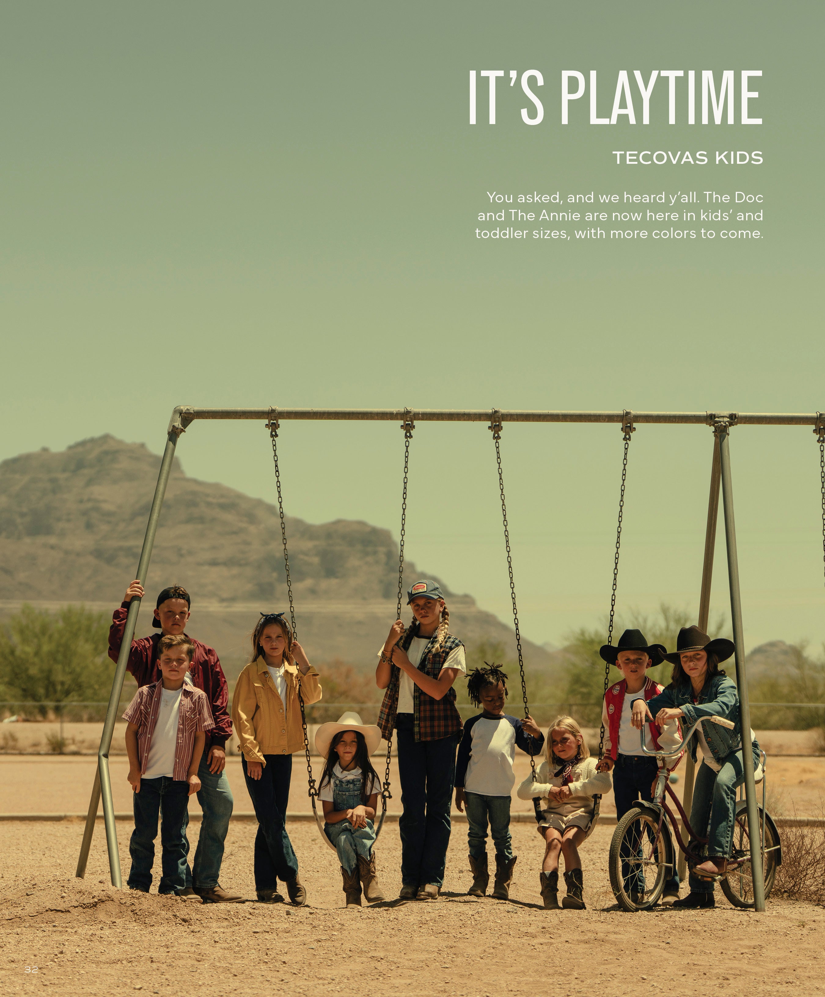 A group of diverse children in cowboy hats and boots standing or sitting on swings in a sunny, dry playground with mountains beyond. Text reads: 'IT'S PLAYTIME TECOVAS KIDS.'