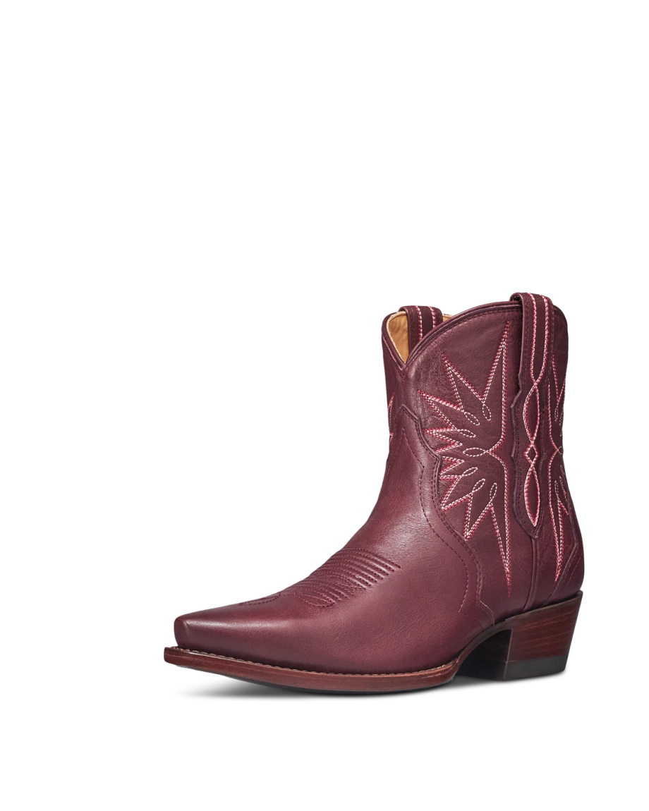 Quarterfront view of The Lynn - Wine Cowhide on plain background