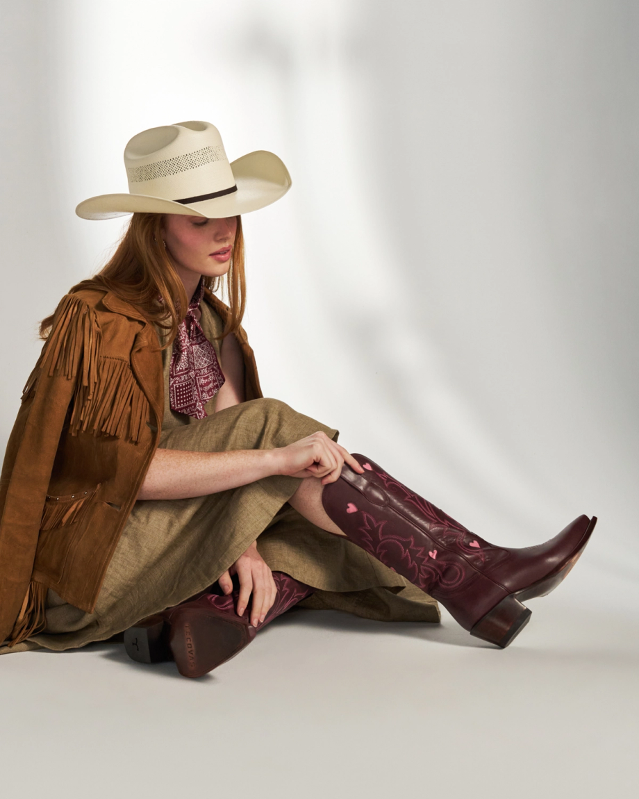 Full view of The Annie Hearts - Wine Cowhide on model