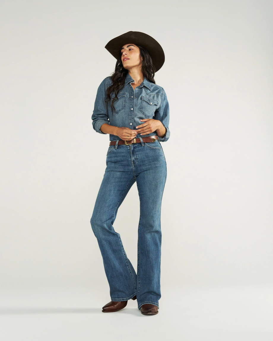 Full view of Women's Mid-Rise Slim Flare - Medium Wash on model